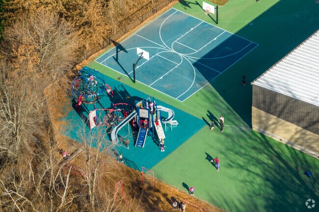 Children at recess play at Charles A. Bernazzani Elementary School in Quincy.