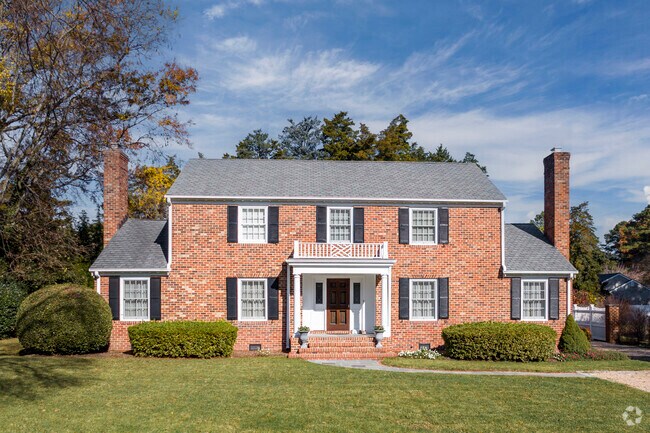 Brick colonial-style homes are a common sight in the neighborhood.