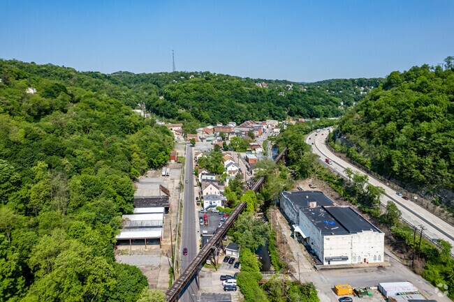 West End follows the Saw Mill Run tributary around to the West End Circle.