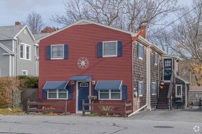 This elegant duplex in the Acushnet neighborhood has shingles and clapboard siding.