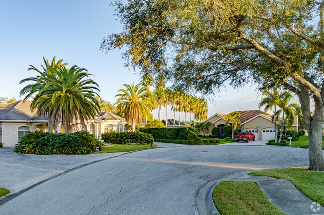 Many of the residential streets in The Plantation are lined with trees.