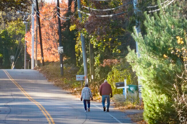 Sciutate residents enjoy the great outdoors and fall foliage on long leisurely walks.
