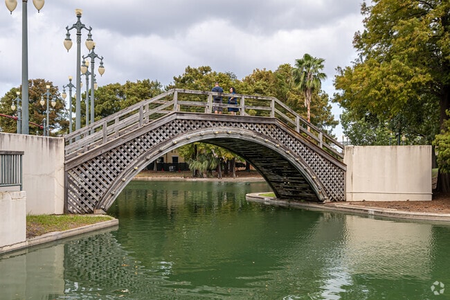 Enjoy the foot bridges at Louis Armstrong Park.