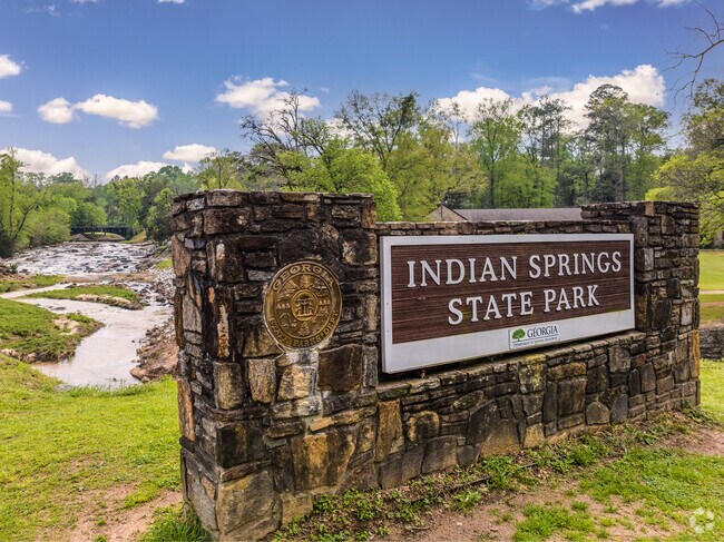 The entrance to Indian Springs State Park sits next to the river in Butts County.