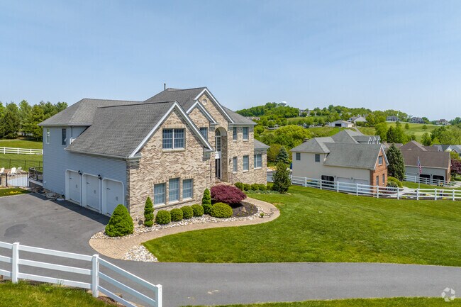 Atop the rolling hills of Williams Township are large brick and stone colonials featuring large yards and backyard pools.