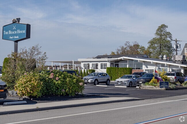 The Beach House Restaurant offers waterfront dining in Mount Hope High School neighborhood.