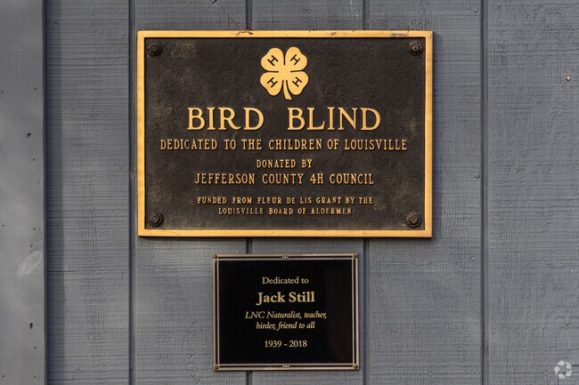 This is a memorial plaque dedicated to one of the many patrons of The Louisville Nature Center.