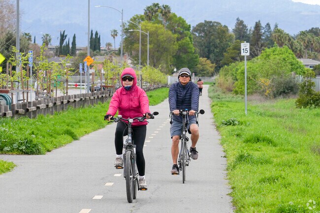 A couple biking in Martial Cottle park in the Del Robles neighborhood.