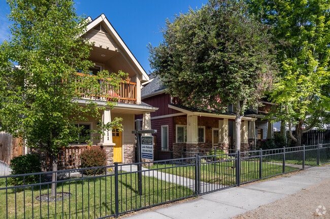 Rows of colorful two story homes are common in the valley beneath the Foothills.