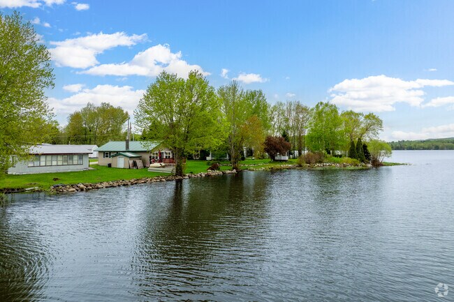 Smaller cottages can be found dotting the shoreline of Lake Derby in Derby Center.