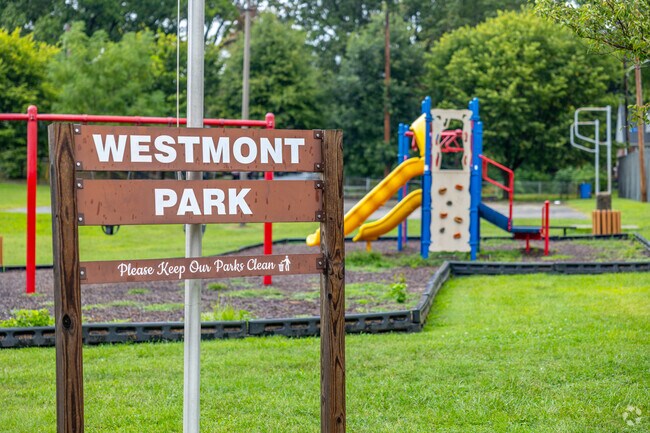 Westmont Park in Collingdale has a blacktop and jungle gym with a rock wall.