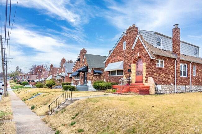 Enjoy a peaceful walk down one of Baden's boulevard streets to see many beautiful brick homes.