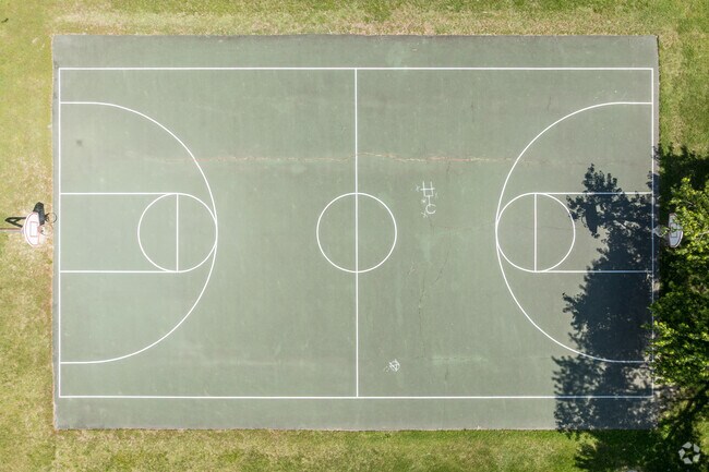 Many friendly basketball games happen in the warmer months on the court at Hebron Lions Park.
