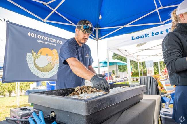 An oyster vendor prepares for a busy event at Harvest Day at the Big E in West Springfield.