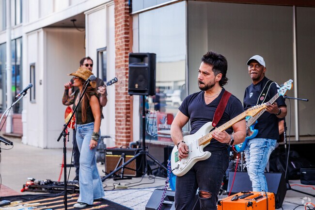 Residents from Murphy and Leffen take in live music at Joplin's Third Thursday.