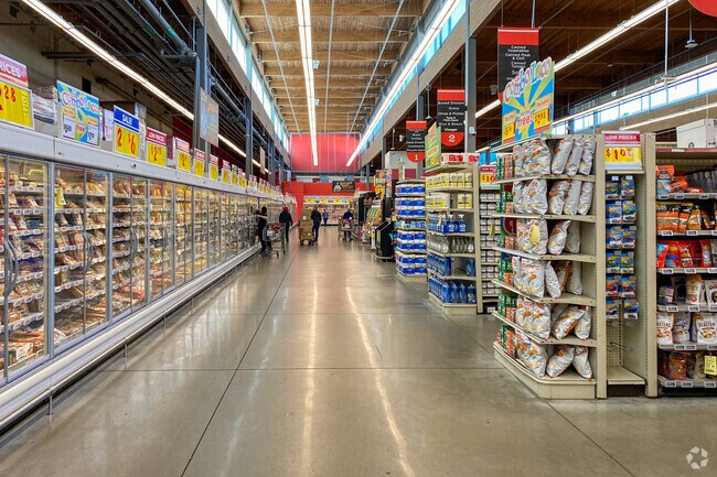 Explore the well kept aisles of H-E-B Grocery in Walnut Creek Greenbelt.