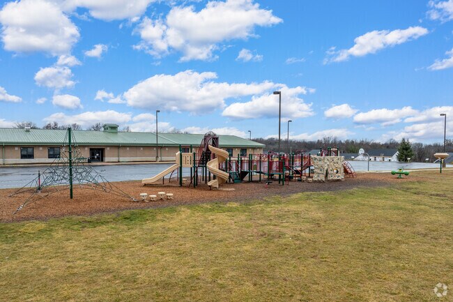 Duello Elementary School has a playground next to the bus pickup lot.
