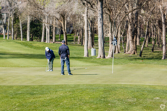 Get your friends together for a round of golf at Reflection Ridge Golf Course by Ridgeport.