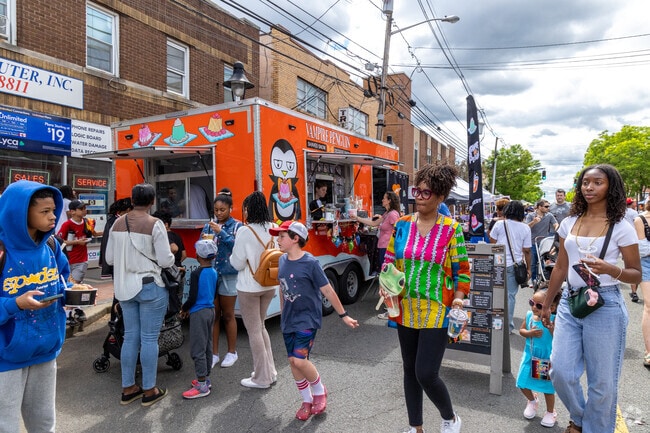 The Maplewood Mayfest Street Fair in NJ is bustling with excitement and fun.