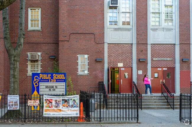 The entrance to PS 139 Alexine A Fenty is located along Rugby Rd.