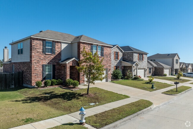 Two story traditional homes can be found in the Woodcreek neighborhood.