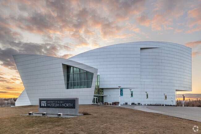 The striking Museum of the North in College lights up the sunset at UAF campus.