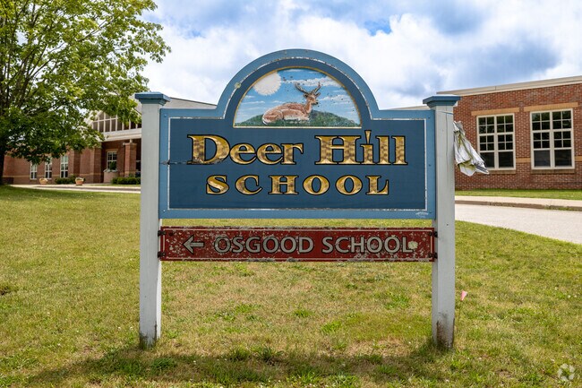 A playful sign directs you to Deer Hill School in Cohasset.