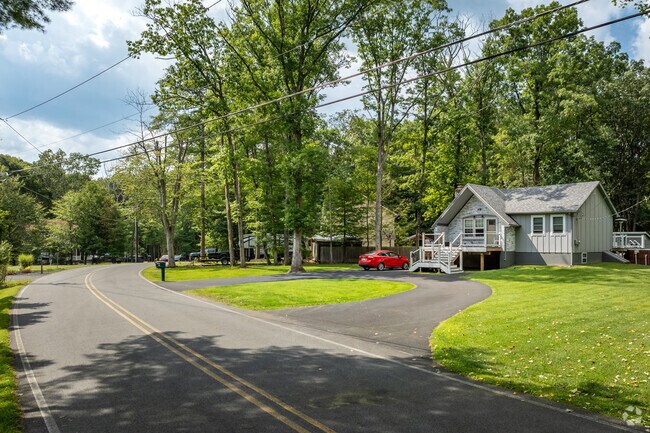 On quiet, winding roads, 1970s cabins and New Traditional homes nestle together in Pocono Haven.