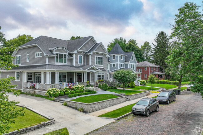 Rows of beautiful newly renovated homes sit on generous lots with professional landscaping.