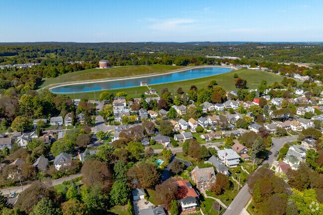 Woodland Reservoir’s paved loop overlooks Lilly’s Grove, a popular sunset spot.