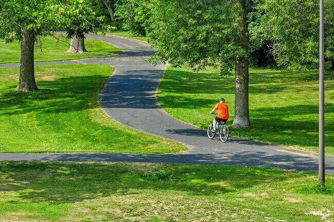 Cyclists will love the winding, wooded trails of the Shingle Creek neighborhood.