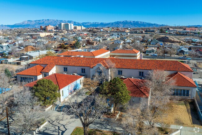 Eugene Field Elementary School with the Sandia Mountains in the background.
