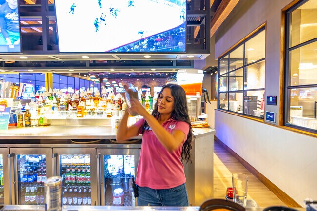 At Main Event Tucson near Rose, unwind with a handcrafted cocktail after a day of bowling and arcade games.