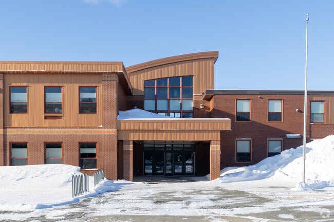Presque Isle Middle School serves the local community by providing a crucial bridge between elementary and high school, fostering academic growth and social development during the formative middle school years.