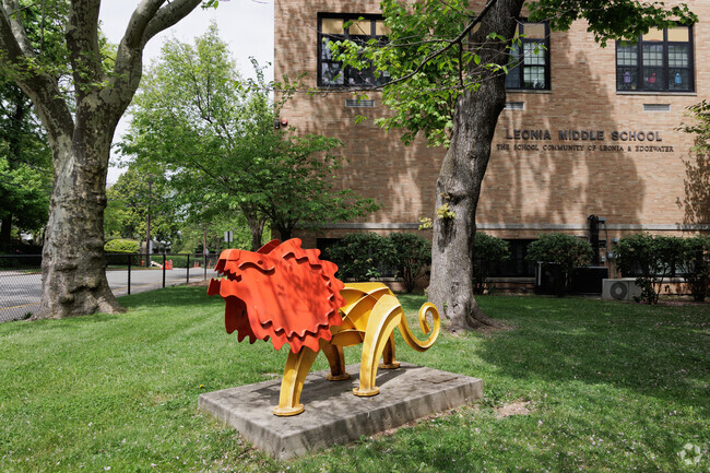 A statue of a lion in front of Leonia Middle School in Leonia, NJ.