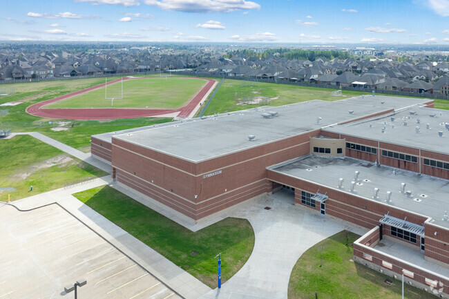 Student engage in physical education at Smith Middle School's gym facility.