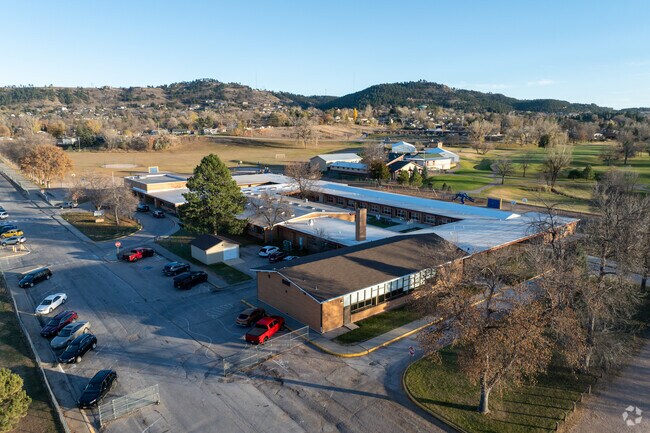 The welcoming front entrance of Meadowbrook Elementary School reflects community pride in Rapid City.