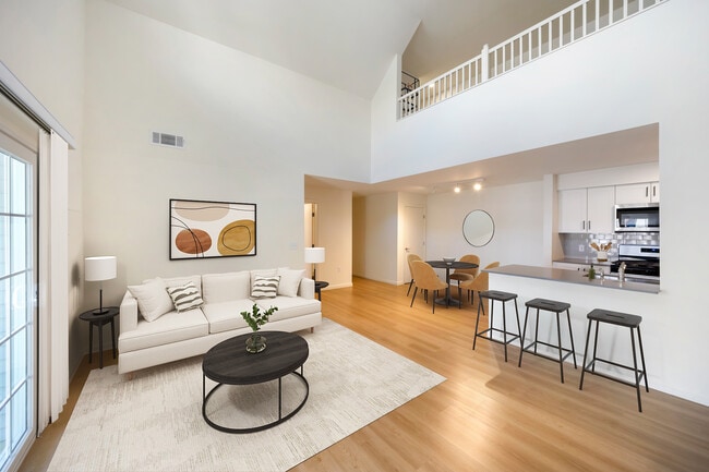 New Apartments kitchen, dining, and living room with hard surface flooring