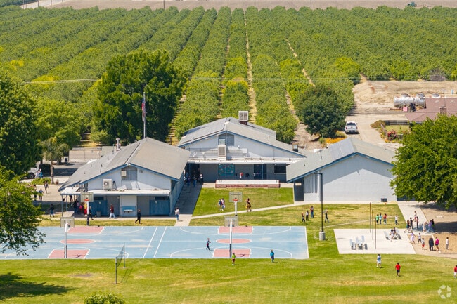 Buena Vista Elementary School offers students basketball courts and soccer fields.