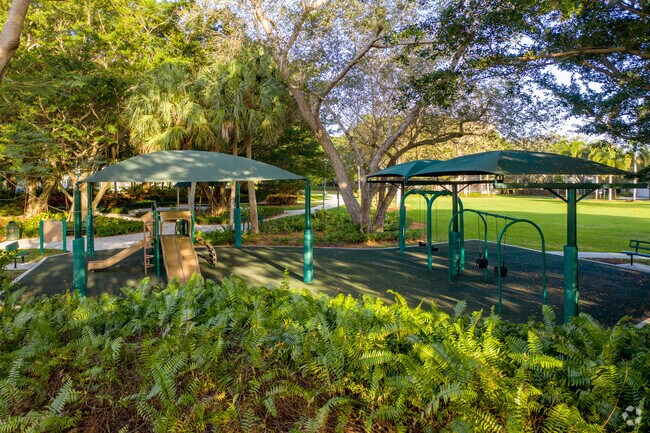 Shaded playground at Country Isles Park.