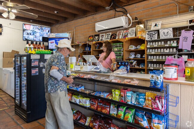 Nearby residents go to One Stop Meat Market for meats and snacks.