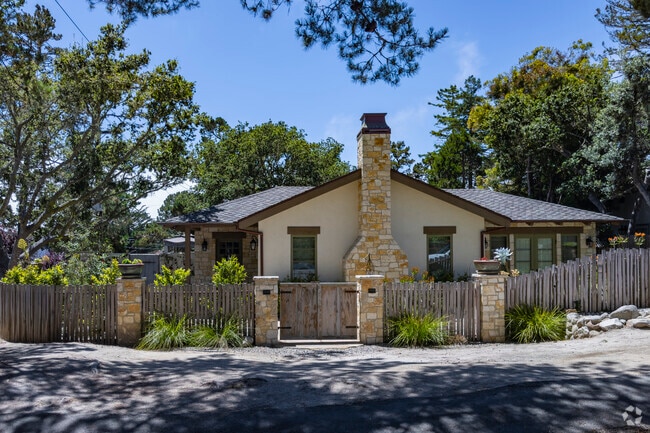 Cobblestone chimney accent on this spanish cottage here in Carmel-By-The-Sea, California.