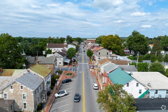Main Street threads through brick and stone storefronts in Annville.