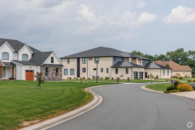 Highland Acres has many new traditional homes on large lots.