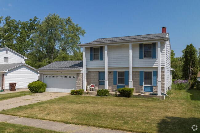 One of a few colonial style homes sprinkled throughout the Lansing-eaton neighborhood.
