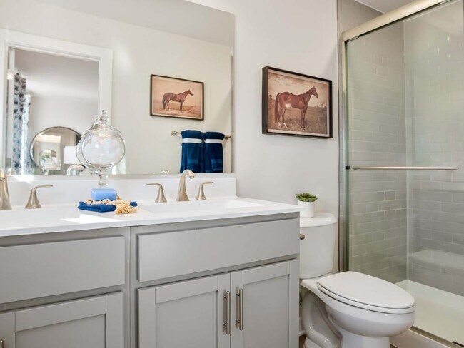 St. Paul is perfect for roommates: 3.5 baths, dual vanities, and easy-to-maintain bathrooms.
