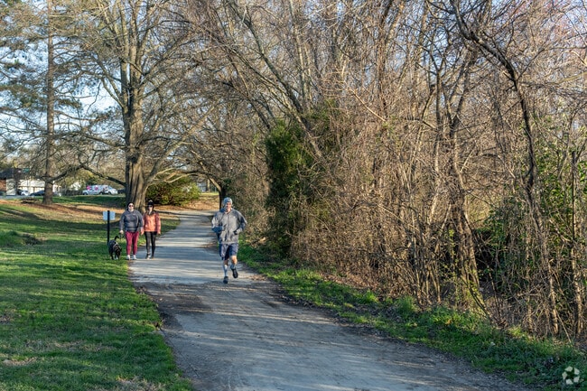 Locals love running and walking the trails at Latham Park in Greensboro.