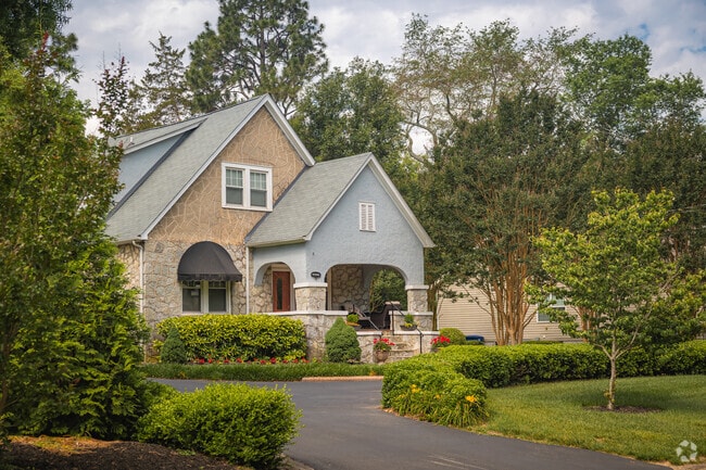 Arched stucco porches bring character to Brainerd Hills homes.