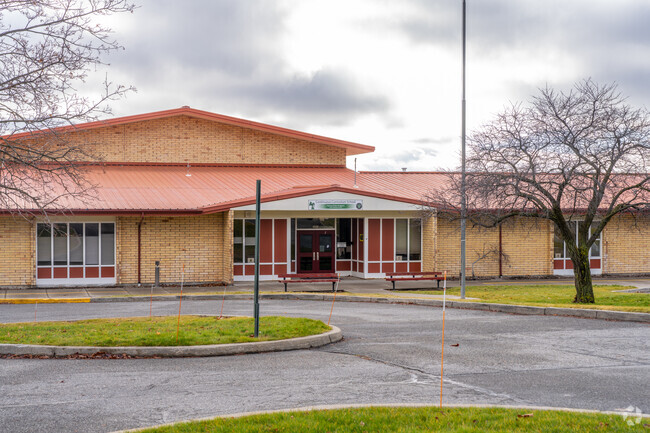 The Continuous Curriculum school is located in a residential neighborhood.