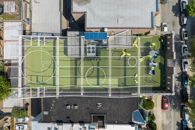 Aerial full view rooftop playground St. Clement School Private Pre-K, Elementary, Chicago.